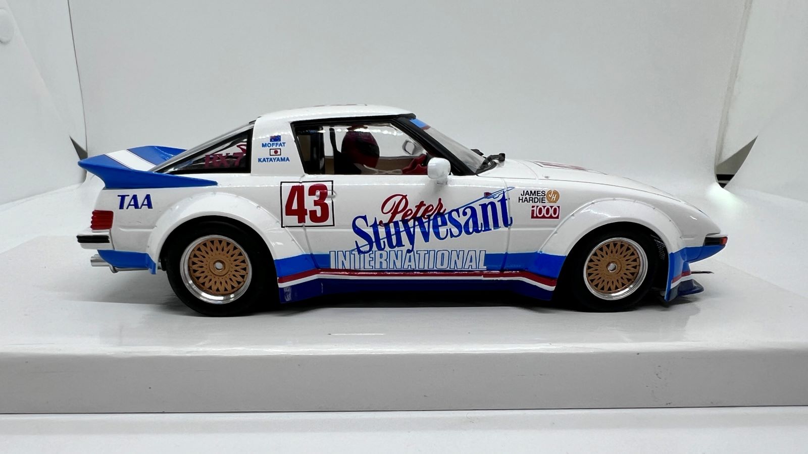 PRE ORDER DUE DECEMBER 2025 RS0293 REVO SLOT MAZDA RX7 ALLAN MOFFAT PETER STUYVESANT #43 1:32 SLOT CAR